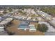 Aerial view of community with pool and homes at 37401 Wedgewood Dr, Zephyrhills, FL 33542