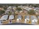 Aerial view of a neighborhood with houses and landscaping at 37401 Wedgewood Dr, Zephyrhills, FL 33542