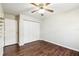 Spacious bedroom featuring wood floors and a large closet at 37401 Wedgewood Dr, Zephyrhills, FL 33542