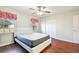 Bedroom with full-size bed and double-door closet at 37401 Wedgewood Dr, Zephyrhills, FL 33542