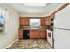 Bright kitchen with wood cabinets and tile floors at 37401 Wedgewood Dr, Zephyrhills, FL 33542