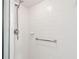 Shower stall with tiled walls and handheld shower head at 37401 Wedgewood Dr, Zephyrhills, FL 33542