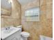 Clean bathroom with beige tile and a bathtub at 4113 S Drexel Ave, Tampa, FL 33611