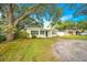 Charming house with mature trees and a spacious yard at 4113 S Drexel Ave, Tampa, FL 33611