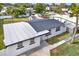 White house with gray roof, viewed from above at 4234 Des Moines Ne St, St Petersburg, FL 33703