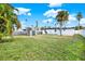 Spacious backyard with shed and grassy area at 4234 Des Moines Ne St, St Petersburg, FL 33703