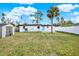 Spacious backyard with a shed and room for outdoor activities at 4234 Des Moines Ne St, St Petersburg, FL 33703