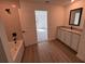 Main bathroom with soaking tub and granite vanity at 4294 Danbury St, North Port, FL 34286