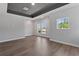 Main bedroom with hardwood floors and large windows at 441 42Nd Ne Ave, St Petersburg, FL 33703