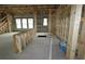 Under construction interior showing framing for a kitchen island and windows at 441 42Nd Ne Ave, St Petersburg, FL 33703