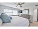 Comfortable main bedroom featuring a king-size bed and dresser at 4455 Duhme Rd # 305, St Petersburg, FL 33708