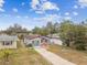 Aerial view showing a single story home with driveway and yard at 4535 33Rd N Ave, St Petersburg, FL 33713