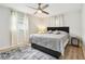 Spacious bedroom with a ceiling fan and large windows at 4535 33Rd N Ave, St Petersburg, FL 33713