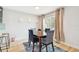 Dining room with wood table, four chairs, and light walls at 4535 33Rd N Ave, St Petersburg, FL 33713