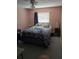 Bright bedroom with a double bed and window coverings at 4701 Lodestone Dr, Tampa, FL 33615