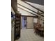 Dining room with wood floors and brick accent wall at 4701 Lodestone Dr, Tampa, FL 33615