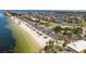 Aerial view of beach, parking, and residential area at 4829 Jenny Way, New Port Richey, FL 34652