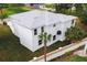 Aerial view showcasing the home's rear elevation and landscaping at 4829 Jenny Way, New Port Richey, FL 34652