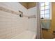 Bathroom with white subway tile and bathtub at 5053 3Rd N Ave, St Petersburg, FL 33710