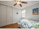 Bedroom with hardwood floors, ceiling fan, and window at 5053 3Rd N Ave, St Petersburg, FL 33710