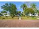 Cute bungalow with a charming front porch and landscaped yard at 5053 3Rd N Ave, St Petersburg, FL 33710