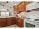 Kitchen with granite countertops and wooden cabinets at 5053 3Rd N Ave, St Petersburg, FL 33710