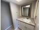 Clean bathroom with vanity, sink, and mirror at 5205 Landsman Ave, Tampa, FL 33625