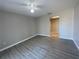 Bright bedroom featuring wood-look floors at 5205 Landsman Ave, Tampa, FL 33625