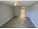 Bedroom with light walls and laminate flooring at 5205 Landsman Ave, Tampa, FL 33625