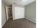 Spacious bedroom with carpet and large closet at 5205 Landsman Ave, Tampa, FL 33625