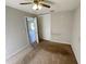 Small bedroom with carpet and closet at 5205 Landsman Ave, Tampa, FL 33625