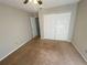 Second bedroom with carpet flooring and neutral color scheme at 5205 Landsman Ave, Tampa, FL 33625