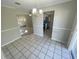 Bright dining area with tile floor and kitchen view at 5205 Landsman Ave, Tampa, FL 33625