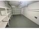 Spacious garage with ample storage shelving at 5205 Landsman Ave, Tampa, FL 33625