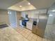 Modern kitchen with stainless steel appliances at 5205 Landsman Ave, Tampa, FL 33625