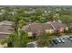 Aerial view of community showing building and parking at 5557 Baywater Dr, Tampa, FL 33615