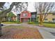 Two-story condo building with red exterior at 5557 Baywater Dr, Tampa, FL 33615