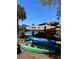 Community kayak storage with various kayaks available at 5557 Baywater Dr, Tampa, FL 33615