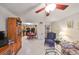 Living room with view into kitchen and dining area at 5557 Baywater Dr, Tampa, FL 33615