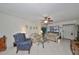 Living room with two couches and a ceiling fan at 5557 Baywater Dr, Tampa, FL 33615