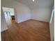 Simple dining area with wood-look tile floors and ample natural light at 5710 Humkey St, North Port, FL 34291