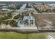 Aerial view of waterfront property, showcasing building and pool at 6504 Surfside Blvd # 5, Apollo Beach, FL 33572