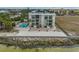 Property overview showcasing the building, pool and waterfront location at 6504 Surfside Blvd # 5, Apollo Beach, FL 33572