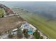 Aerial view of waterfront property with condo, pool, and parking at 6504 Surfside Blvd # 5, Apollo Beach, FL 33572