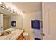 Clean bathroom with a shower/tub combo and vanity at 6504 Surfside Blvd # 5, Apollo Beach, FL 33572