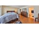 Bright bedroom with ensuite bathroom and hardwood floors at 6504 Surfside Blvd # 5, Apollo Beach, FL 33572