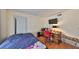 Bright bedroom with a comfortable bed and a workspace at 6504 Surfside Blvd # 5, Apollo Beach, FL 33572