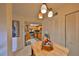 Dining area with wood table and chairs, near kitchen at 6504 Surfside Blvd # 5, Apollo Beach, FL 33572