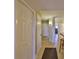 Bright hallway with tile floors and built-in storage at 6504 Surfside Blvd # 5, Apollo Beach, FL 33572