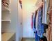 Spacious closet with shelving and hanging rods at 680 71St Ave # 14, St Pete Beach, FL 33706